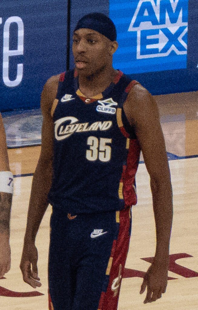 Nae’Qwan Tomlin of the Cleveland Cavaliers in a navy No. 35 jersey