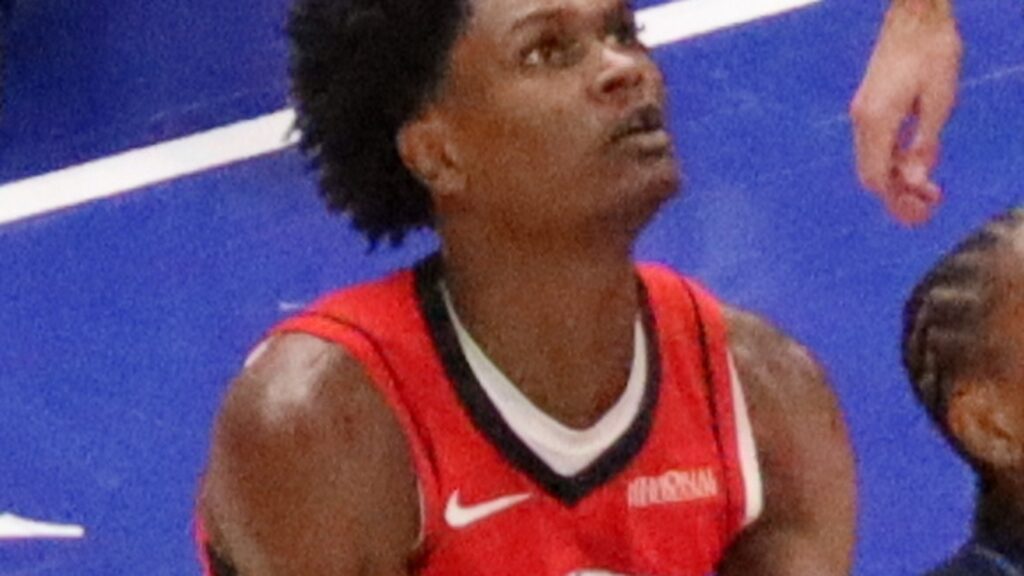 Amen Thompson looks upcourt in a Houston Rockets jersey