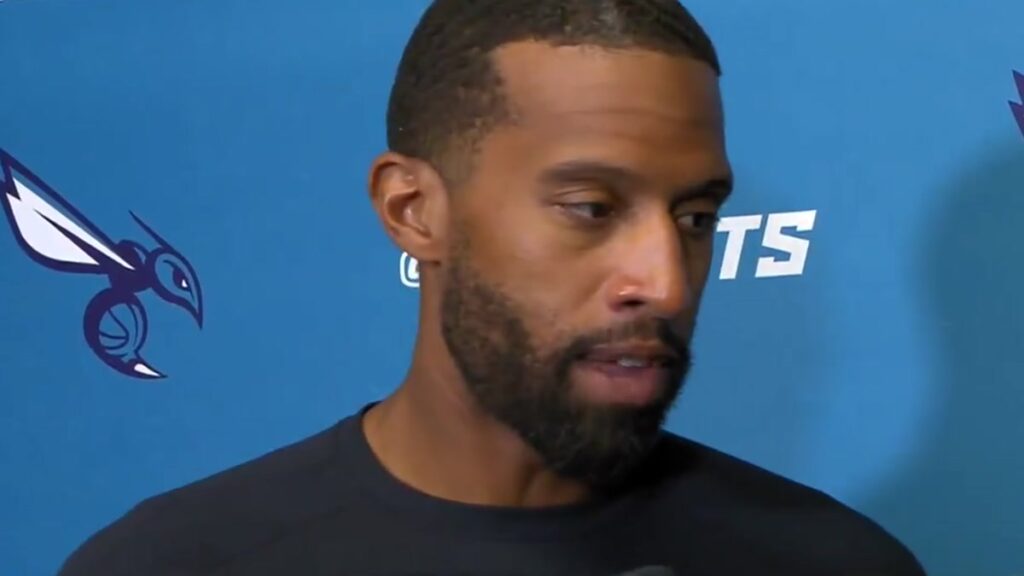 Hornets coach Charles Lee speaks at a postgame news conference after the loss in Detroit
