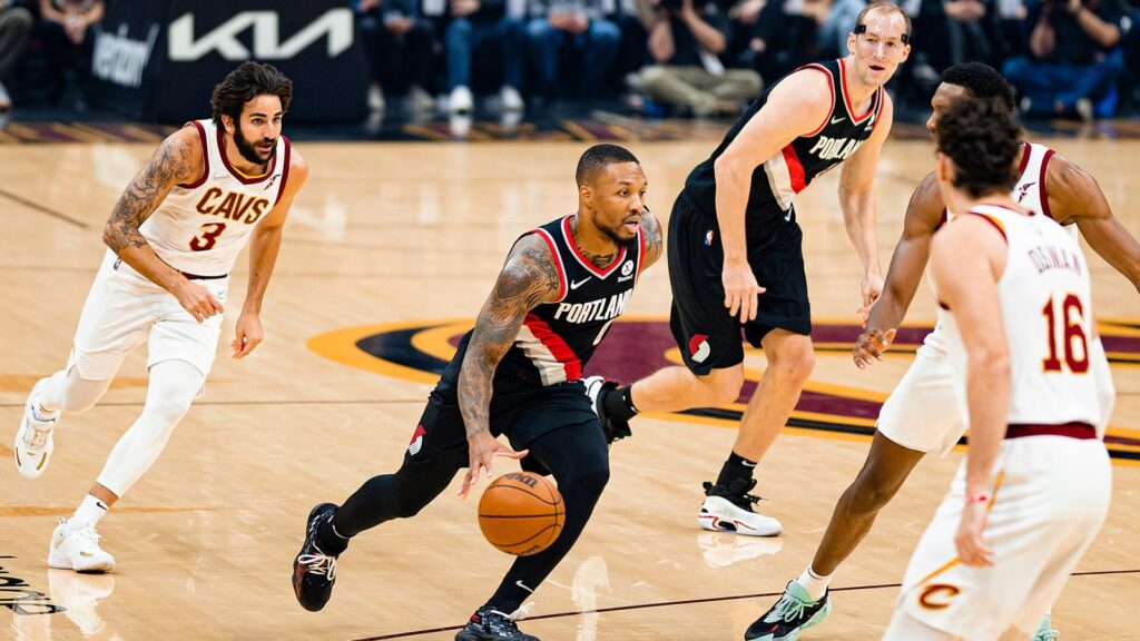 Damian Lillard dribbles up the floor for the Trail Blazers against the Cavaliers