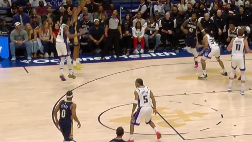 Darius Acuff Jr., wearing No. 5 for the Kings, on the floor against the Pelicans in New Orleans