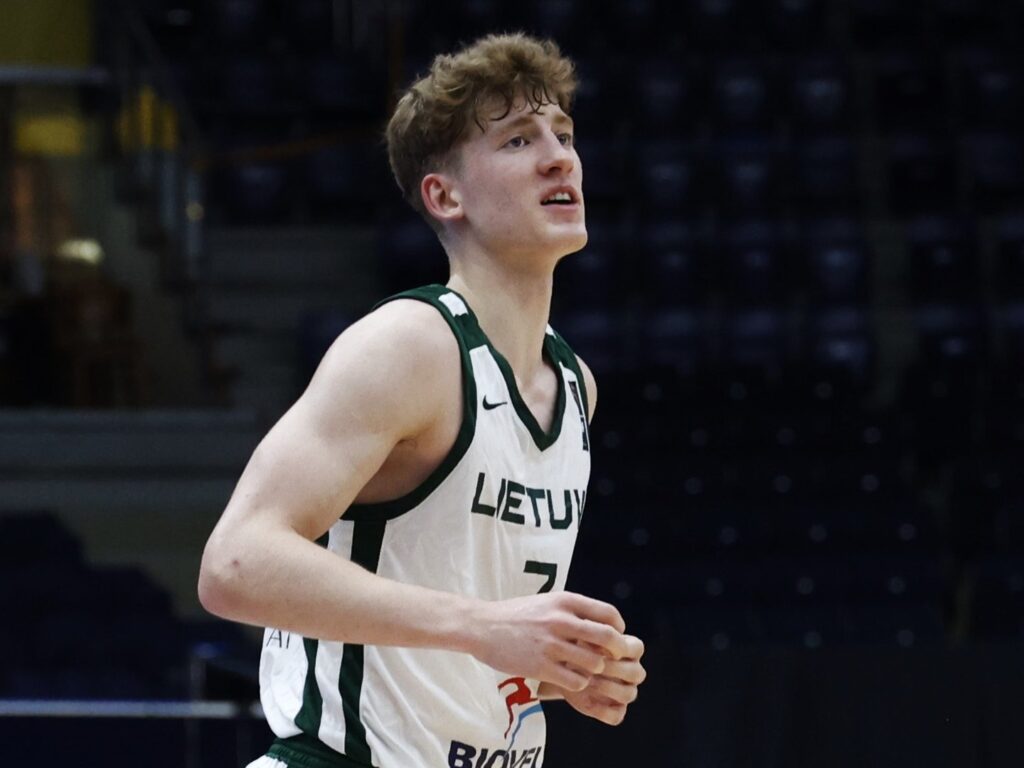 Kasparas Jakučionis in a white Lithuania jersey during the 2024 U18 EuroBasket