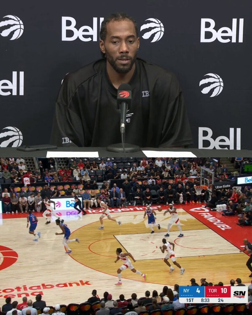Kawhi Leonard speaking into a microphone after a Raptors game