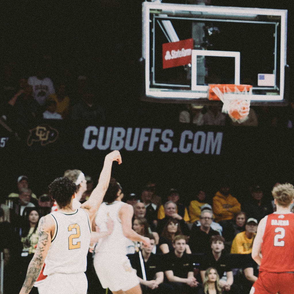 KJ Simpson shooting a three-pointer for Colorado