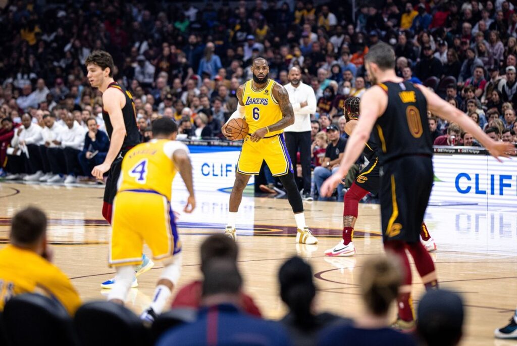 LeBron James brings the ball up the court during a game in Cleveland in March 2022