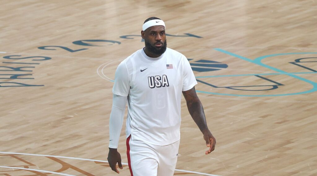 LeBron James in a Team USA warm-up shirt on court at the Paris 2024 Olympics