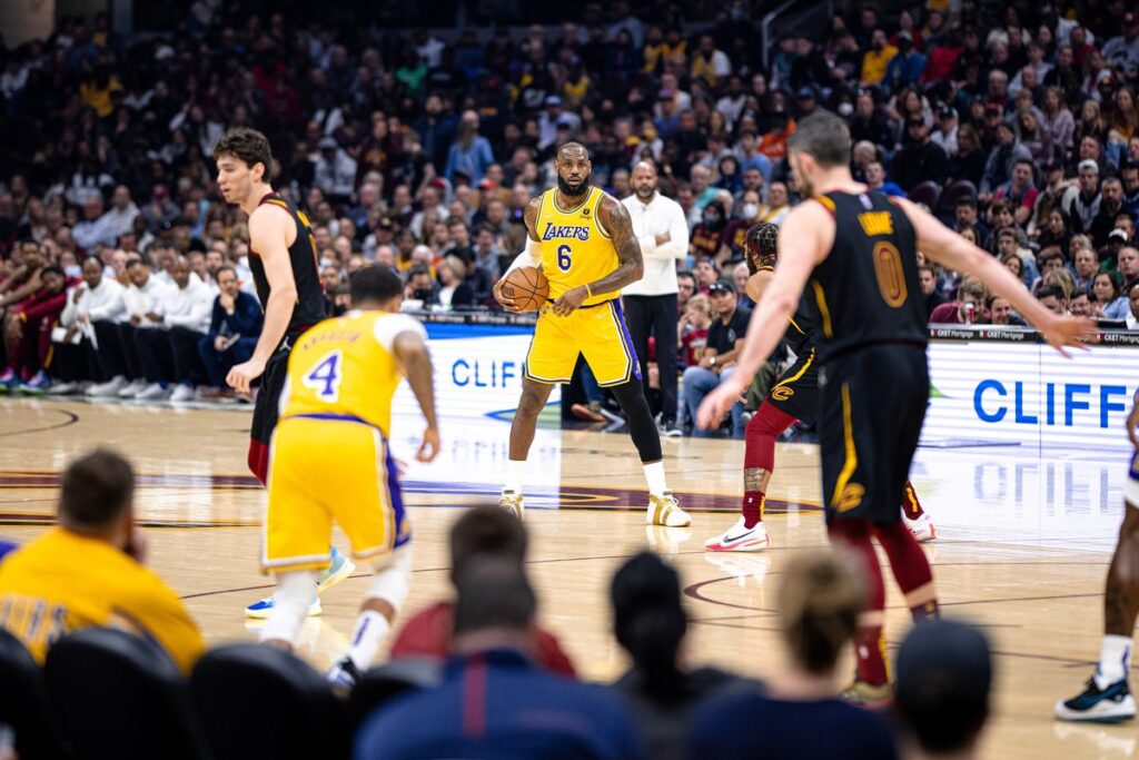 LeBron James dribbling in a Los Angeles Lakers uniform during an NBA game