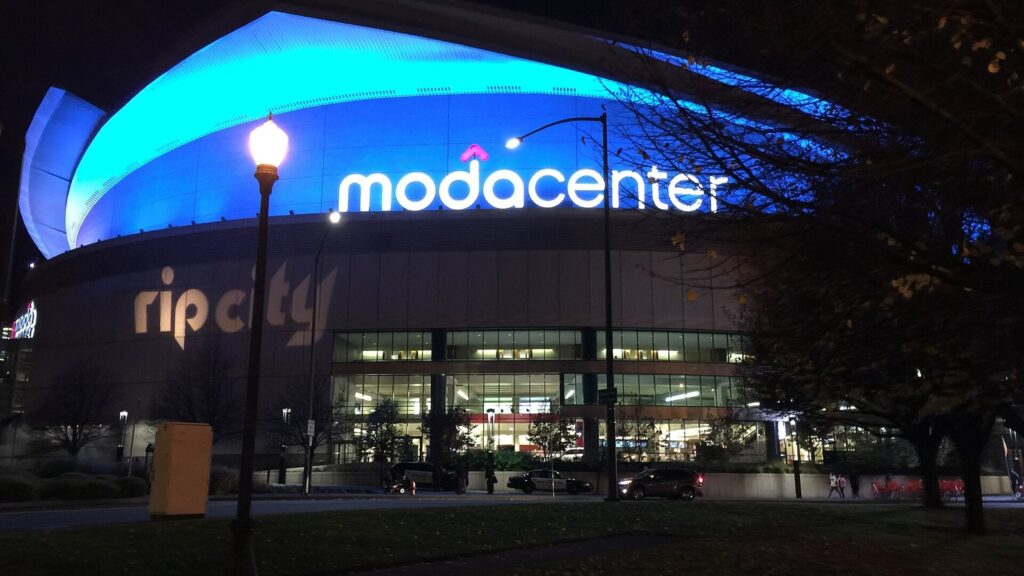 The Moda Center in Portland lit up at night