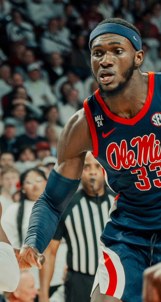 Moussa Cissé wearing an Ole Miss number 33 uniform in a 2024 college basketball photograph