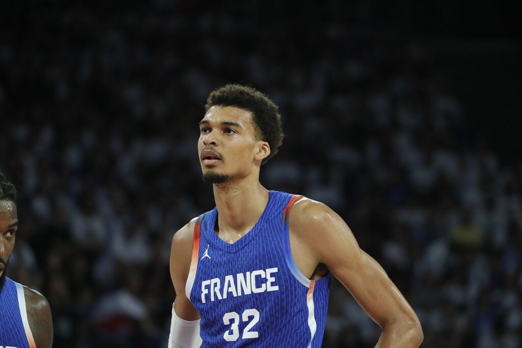 Victor Wembanyama in a blue France national team jersey during a game in July 2024