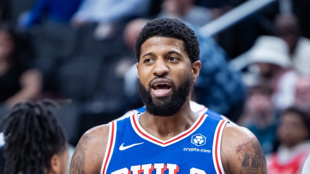Paul George in a blue Philadelphia 76ers No. 8 jersey during a game