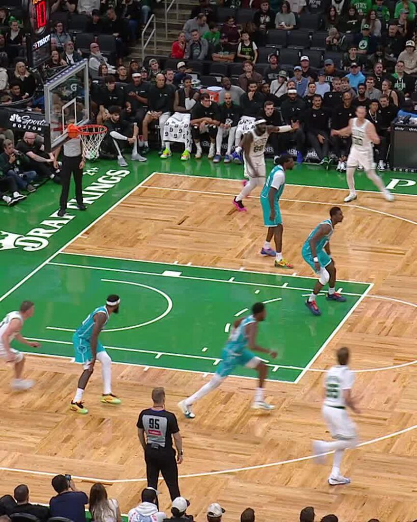Neemias Queta dunks for the Celtics against the Hornets in a preseason game