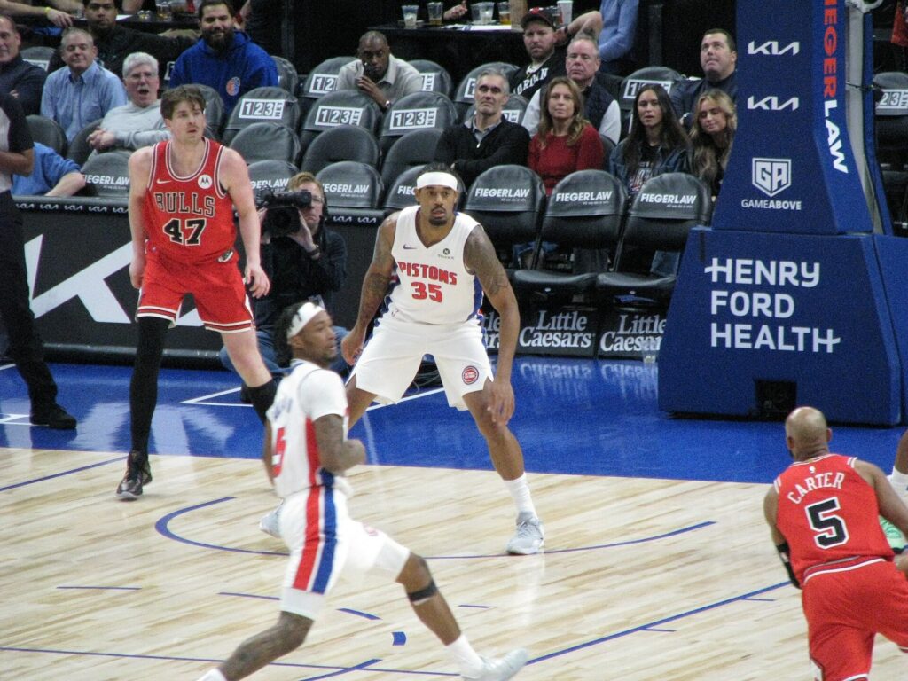 Ron Holland II of the Detroit Pistons on defense at Little Caesars Arena
