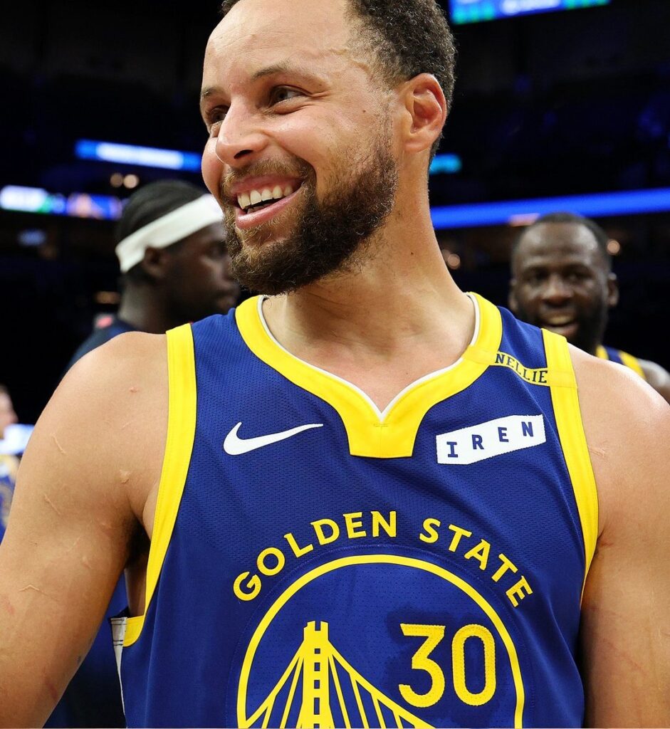 Stephen Curry smiles after the Warriors' win in Minneapolis