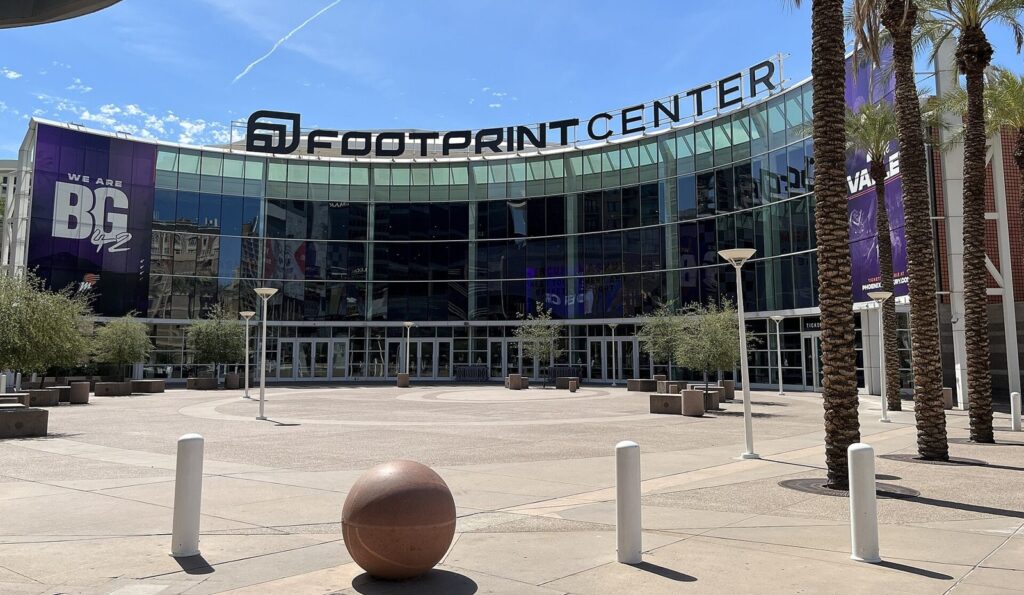 Exterior of the Suns’ downtown Phoenix arena with palm trees