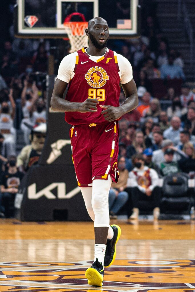 Tacko Fall wearing Cleveland's burgundy No. 99 uniform during a November 15, 2021 game; archival photograph