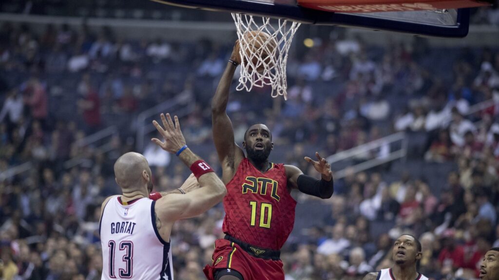 Tim Hardaway Jr. in an Atlanta Hawks uniform dunks against the Washington Wizards