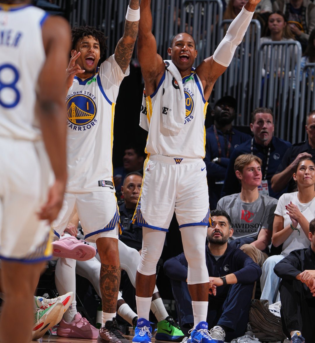 Warriors bench celebrates