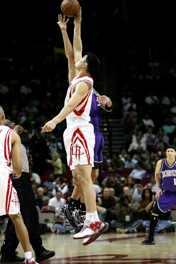 Yao Ming tipping off for the Houston Rockets against the Sacramento Kings